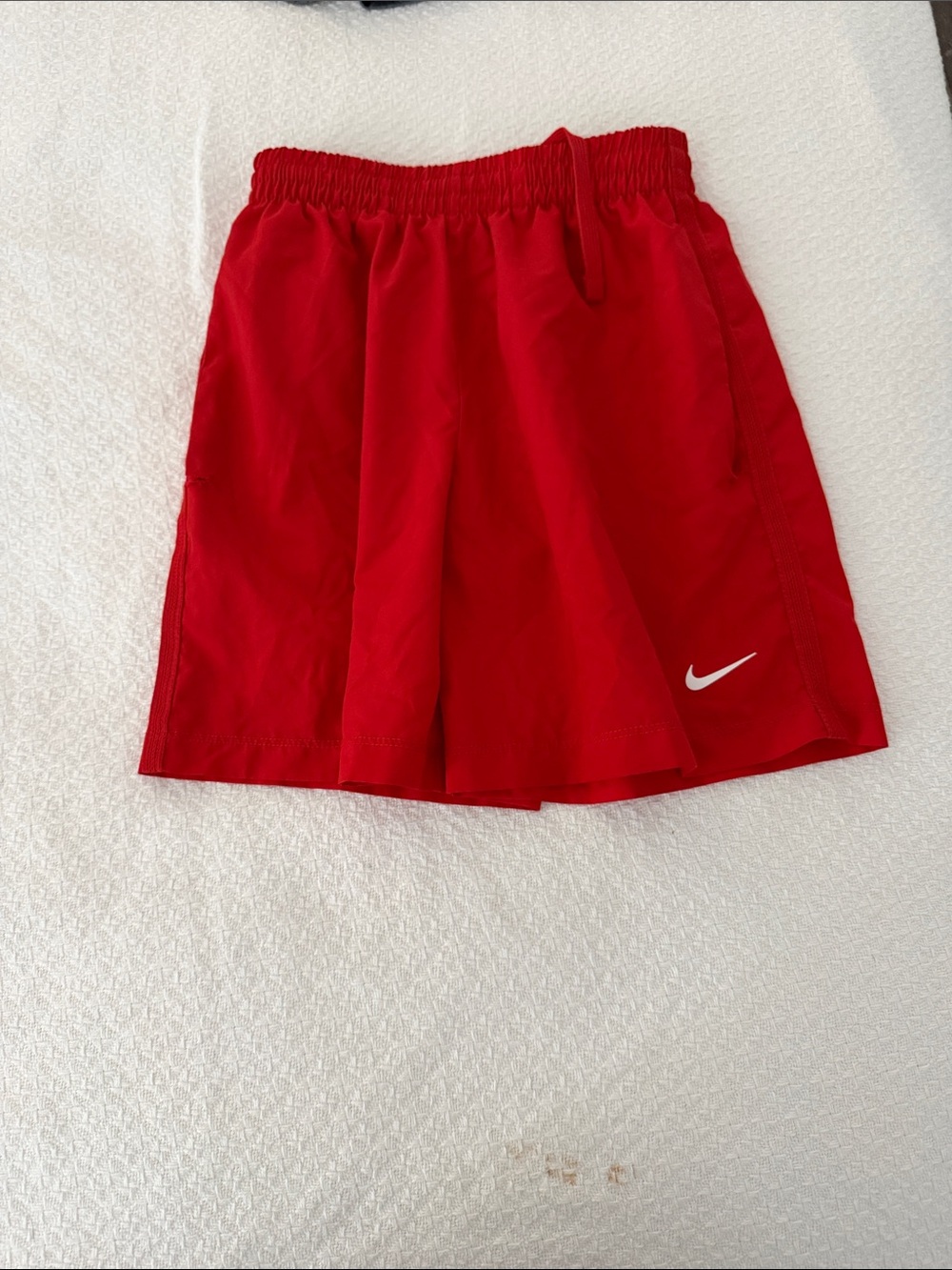 Nike Kids Red Athletic Shorts with White Swoosh